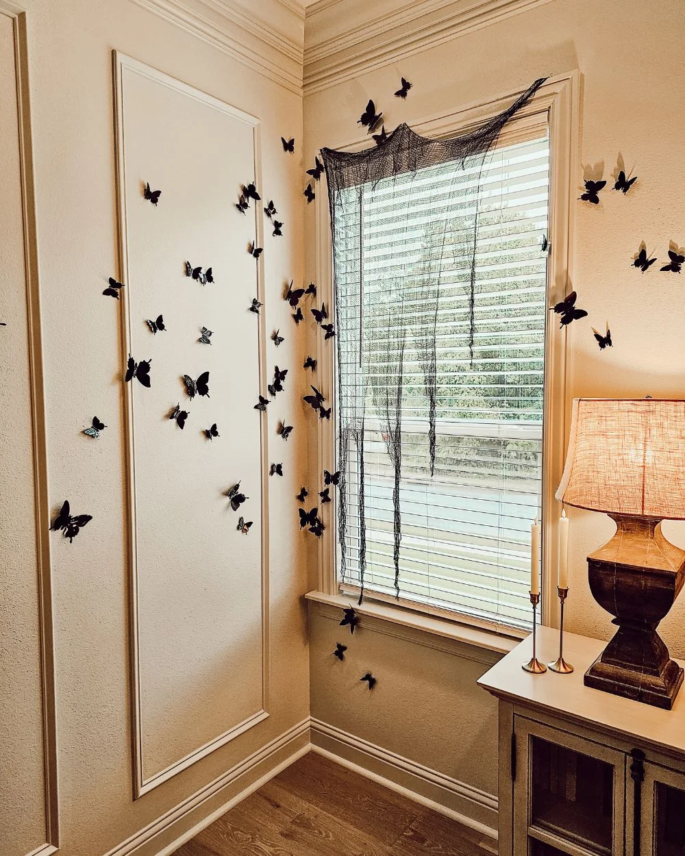 dining room window with black butterflies all over wall