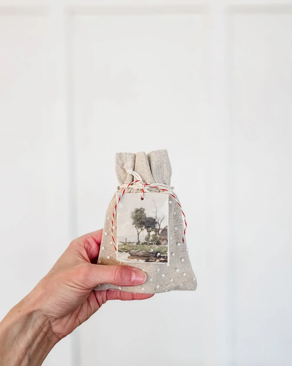 DIY Photo Clay Tags on a gift pouch