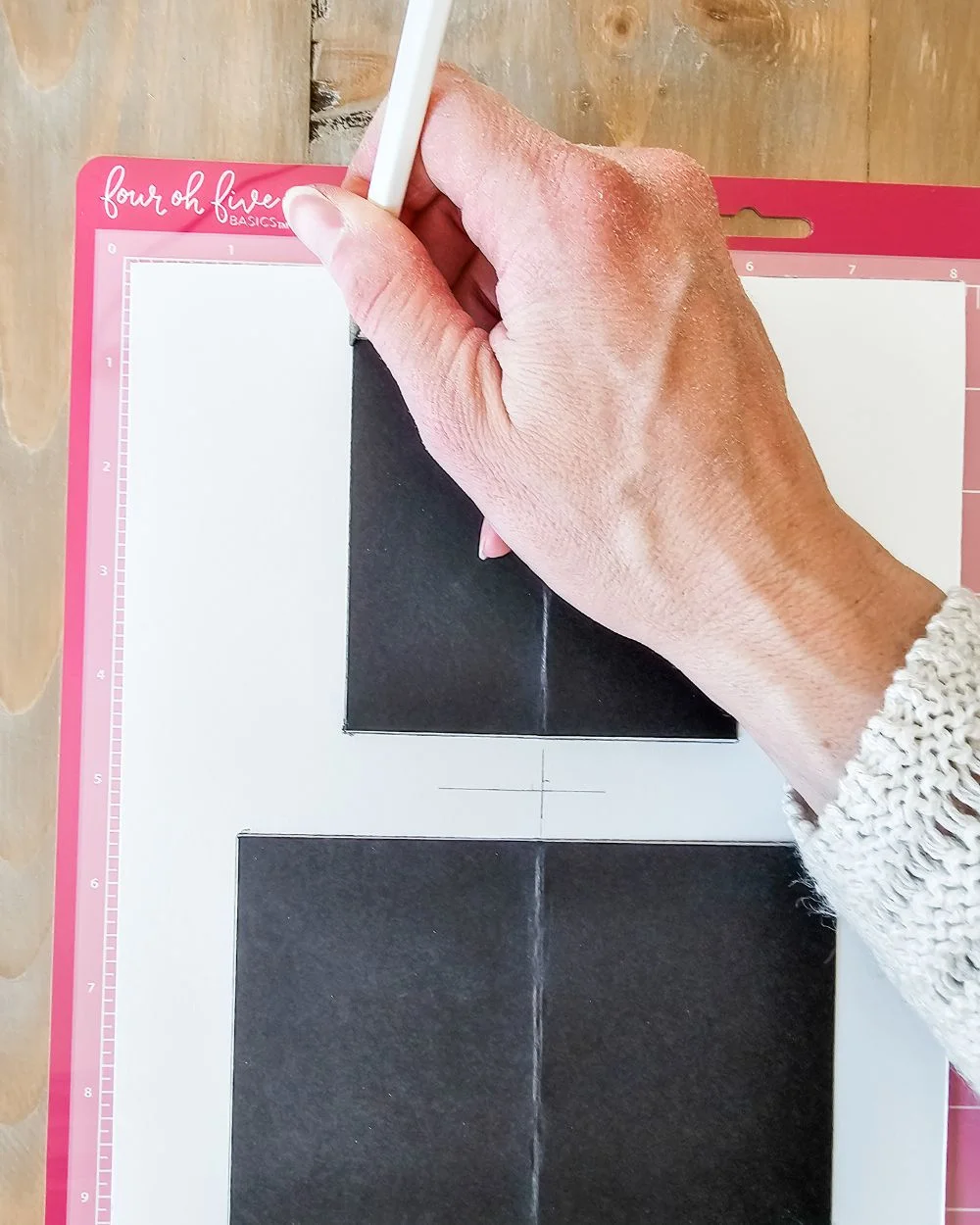 measure and mark the photo holes on the mat